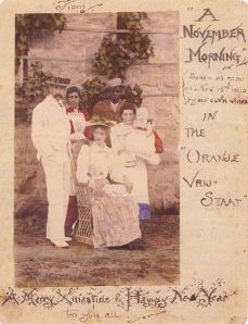 Handwritten Christmas card with a coloured photo of the Tolkien family, sent by Mabel Tolkien from the Orange Free State to her relatives in Birmingham, on November 15, 1892.